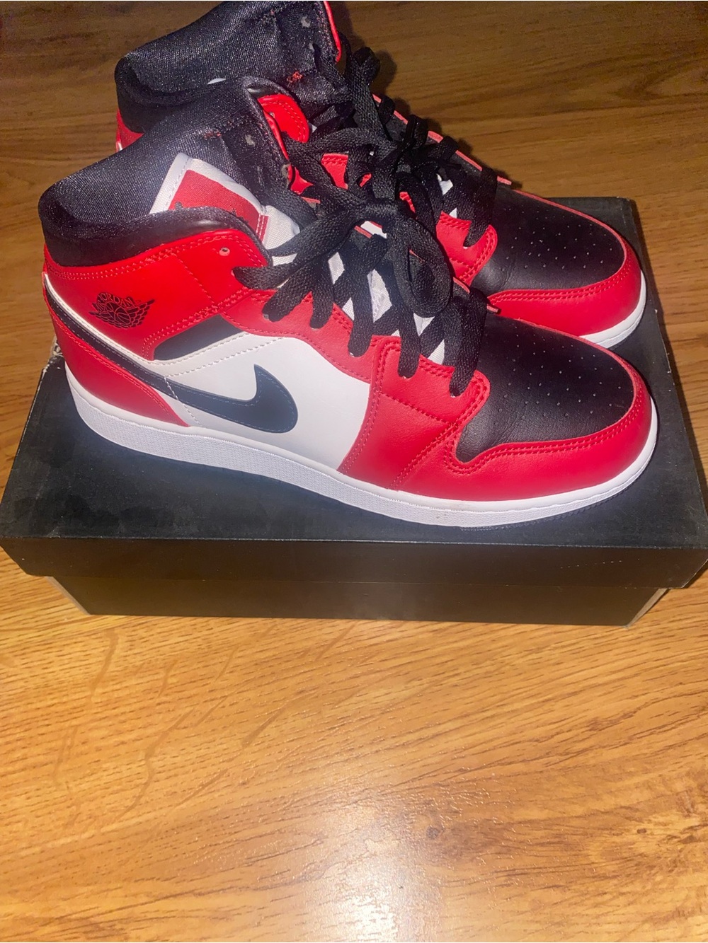Jordan Youth 7 or Women’s 8.5 Sneakers in Red, White, and Black